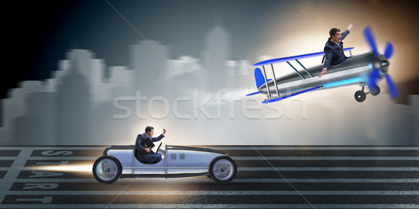 Businessman racing on car and airplane Stock photo © Elnur