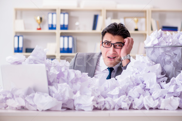 Stock photo: Businessman in paper recycling concept in office