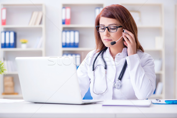Woman doctor in telemedicine concept Stock photo © Elnur