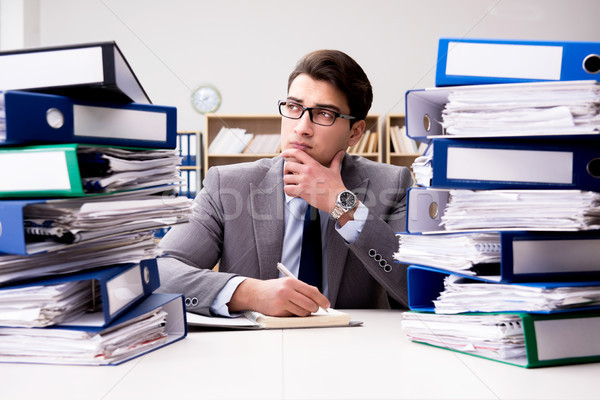 Busy businessman under stress due to excessive work Stock photo © Elnur