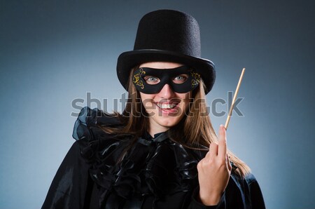 Young woman gangster with gun on white Stock photo © Elnur