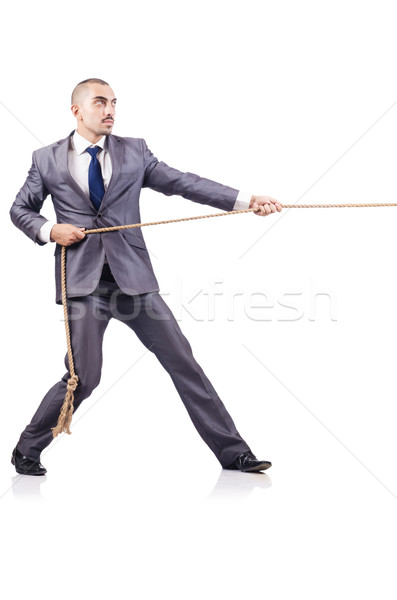 Man in tug of war concept on white Stock photo © Elnur
