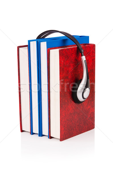 Concept of audio books with earphones on white Stock photo © Elnur