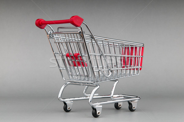 Shopping cart on seamless background Stock photo © Elnur
