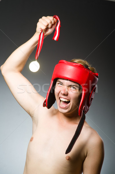 Funny Boxer gewinnen Goldmedaille Hand Hintergrund Stock foto © Elnur