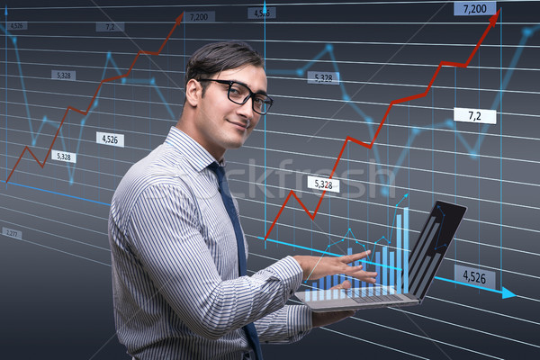 Young businessman in online trading concept Stock photo © Elnur