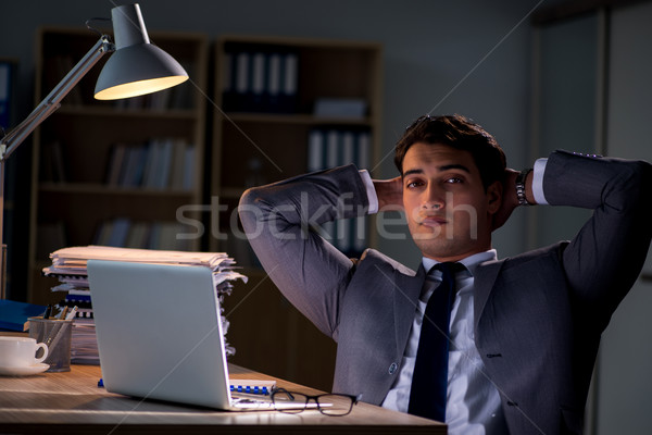 Man staying in the office for long hours Stock photo © Elnur