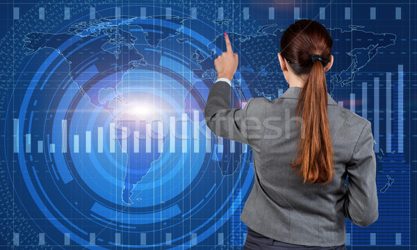 Businesswoman in global business concept Stock photo © Elnur