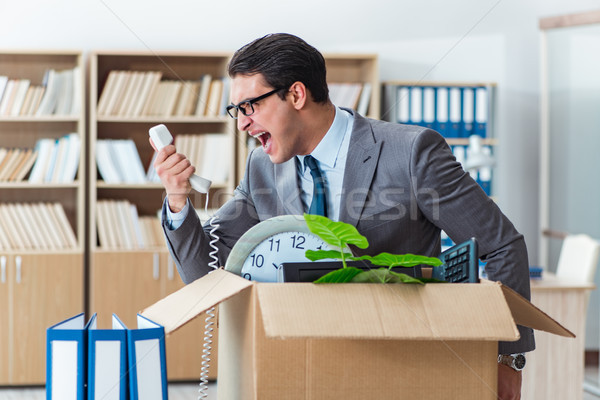 Man moving office with box and his belongings Stock photo © Elnur