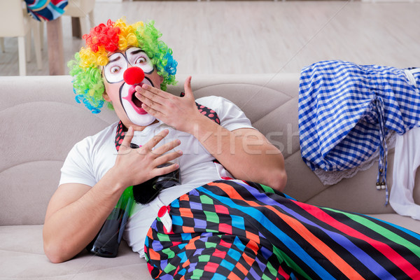 Drunk clown celebrating having a party at home Stock photo © Elnur