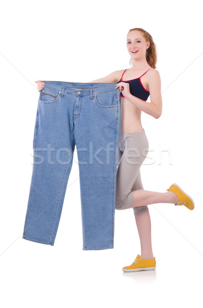 Woman with large jeans in dieting concept Stock photo © Elnur