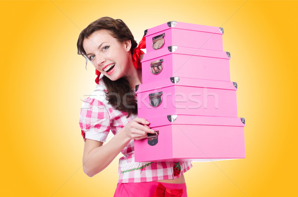Young woman with storage boxes on white Stock photo © Elnur