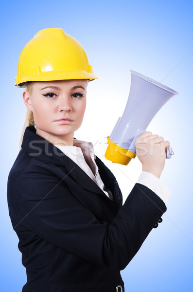 Female construction worker with loudspeaker Stock photo © Elnur