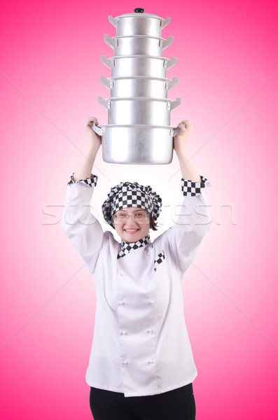 Cook with stack of pots on white Stock photo © Elnur