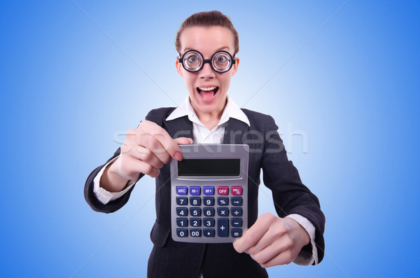 Nerd female accountant with calculator Stock photo © Elnur