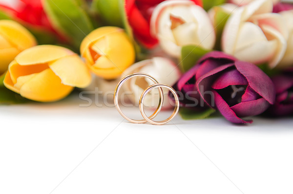 Wedding rings and flowers isolated on white background Stock photo © Elnur