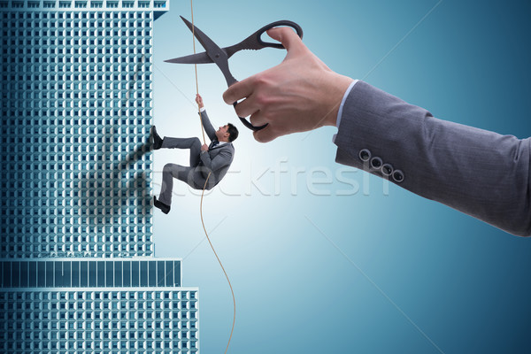 Stockfoto: Zakenman · business · risico · man · trap · wolkenkrabber