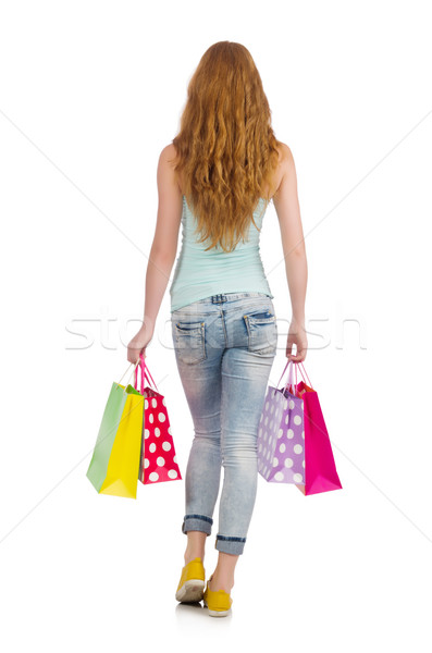 Stock photo: Woman after shopping spree on white