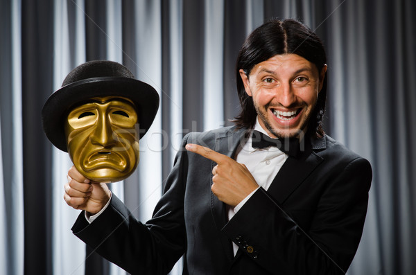 Funny concept with theatrical mask Stock photo © Elnur