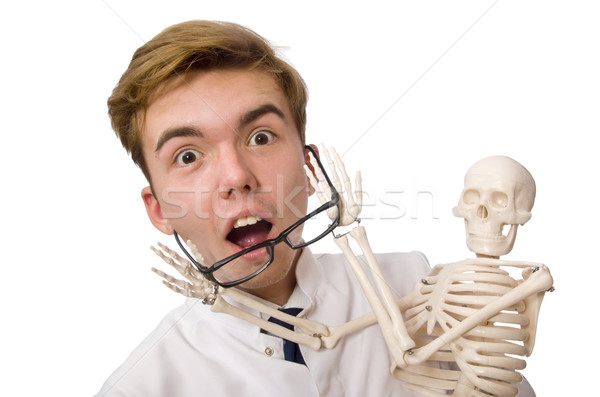 Funny doctor with skeleton isolated on white Stock photo © Elnur