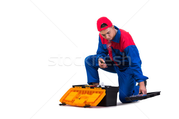 Young repairman with wrench spanner isolated on white Stock photo © Elnur