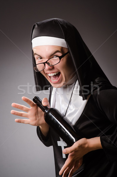 Funny man wearing nun clothing Stock photo © Elnur