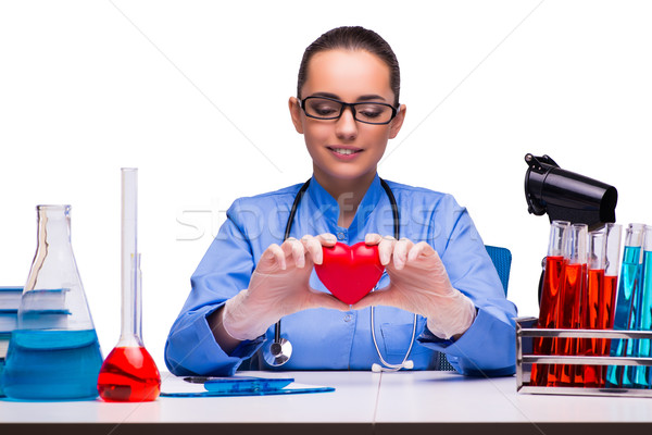 Young female doctor in lab isolated on white Stock photo © Elnur