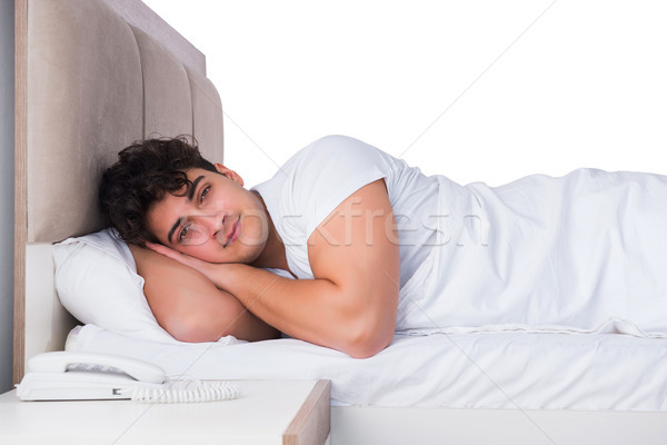 Homme lit souffrance insomnie triste dormir [[stock_photo]] © Elnur