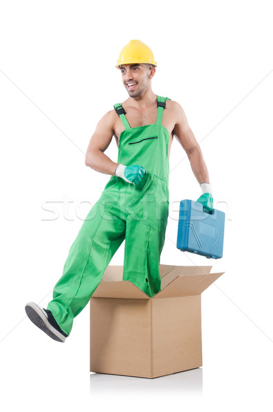 Man in coveralls with boxes Stock photo © Elnur