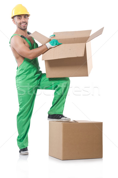 Man in green coveralls with boxes Stock photo © Elnur
