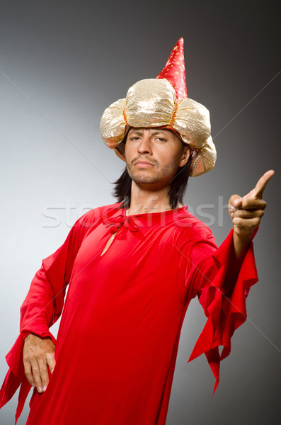 Funny wizard wearing red dress Stock photo © Elnur