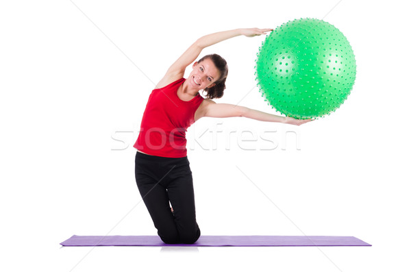 Young woman exercising with swiss ball Stock photo © Elnur