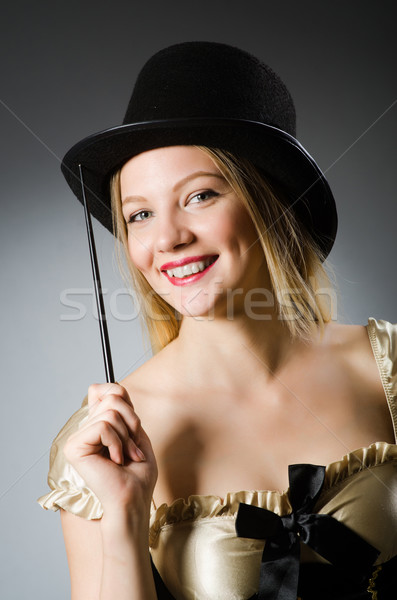 [[stock_photo]]: Femme · magicien · chapeau · main · costume