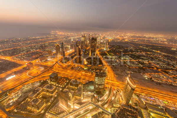 Stock photo: Panorama of night Dubai during sunset