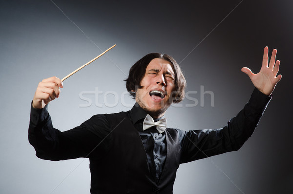 Funny conductor in musical concept Stock photo © Elnur