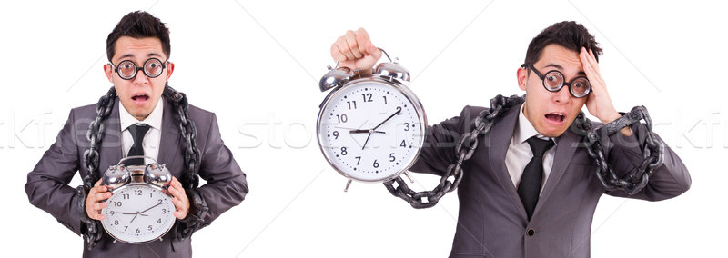 Stock photo: Businessman holding alarm clock isolated on white