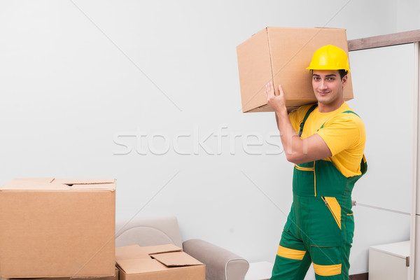 Man delivering boxes during house move Stock photo © Elnur