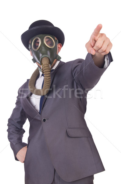 Businessman wearing gas mask isolated on white Stock photo © Elnur