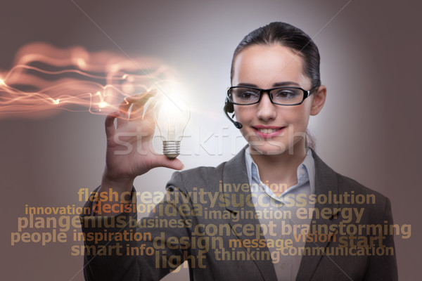 Fiatal ügyfélszolgálat kezelő villanykörte ötlet üzlet Stock fotó © Elnur