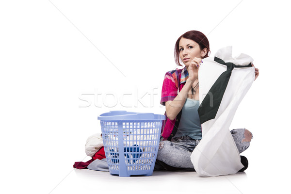 Woman tired after doing laundry isolated on white Stock photo © Elnur