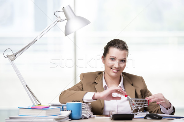 Businesswoman working in the office Stock photo © Elnur