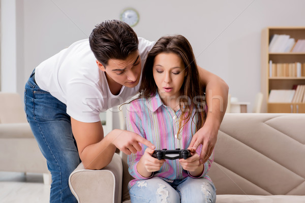 Young family suffering from computer games addiction Stock photo © Elnur