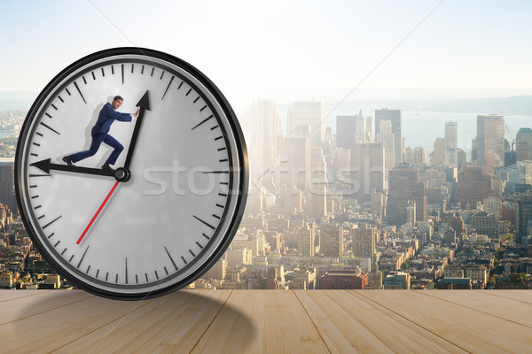 Stock photo: Businessman in time management concept