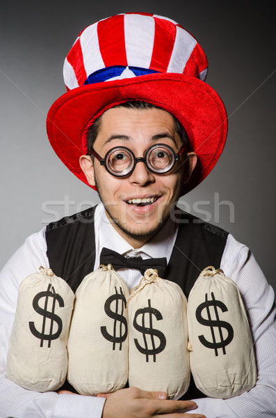 Stockfoto: Grappig · man · amerikaanse · hoed · geld · business