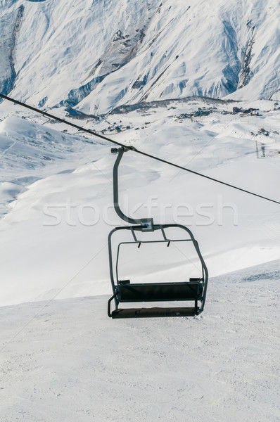 Skilift on ski resort during winter on bright day Stock photo © Elnur