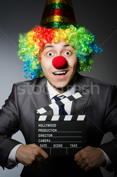 Clown with the movie board Stock photo © Elnur