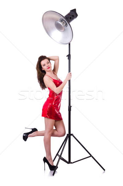Woman in red dress posing in the studio Stock photo © Elnur