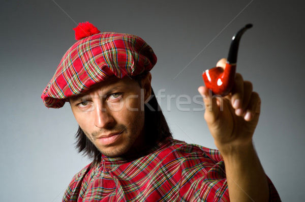 Funny scotsman with smoking pipe Stock photo © Elnur