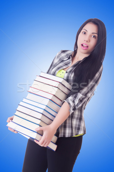 Girl student with books on white Stock photo © Elnur