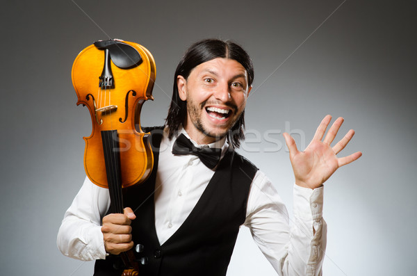 Uomo giocare violino musicale arte divertente Foto d'archivio © Elnur